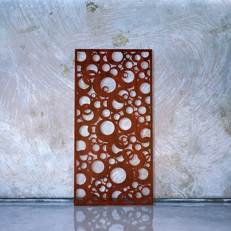 Corten Steel Rusted Laser Cut Screen leaning on Whitewashed Factory Wall