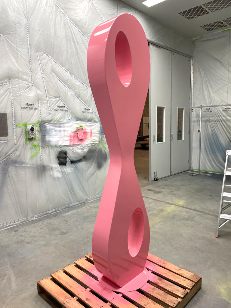 Tall Curvy Stainless Steel sculpture made by Lump Sculpture Studio