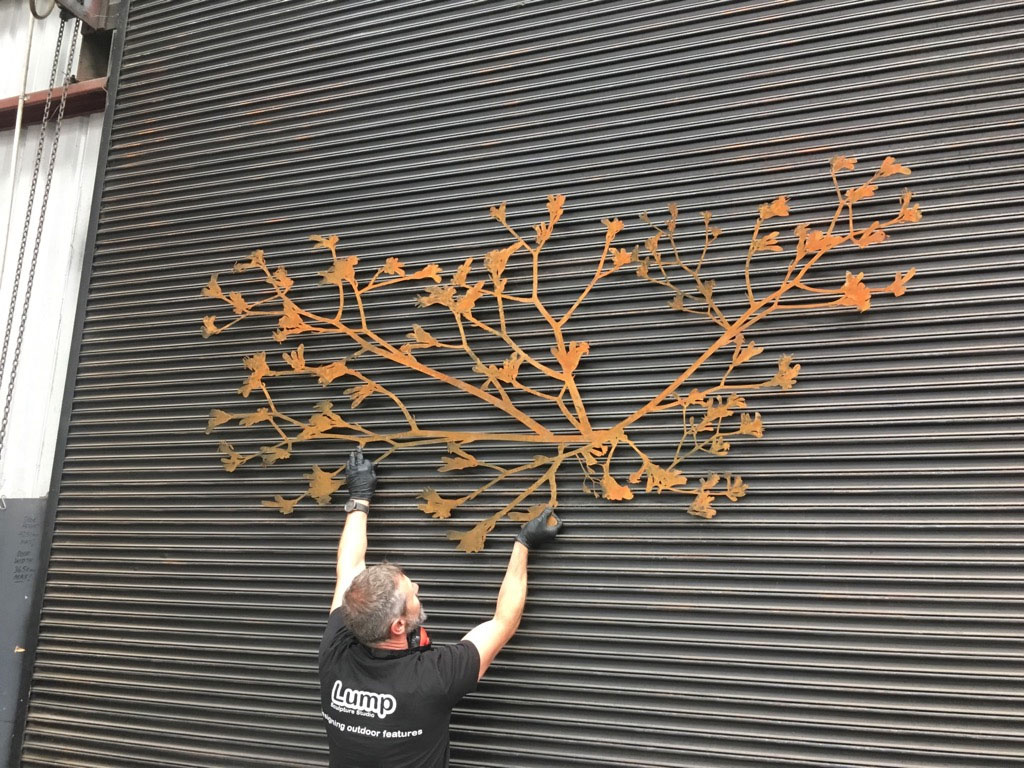 Kangaroo paw flower displayed as Metal wall hanging by Lump Studio