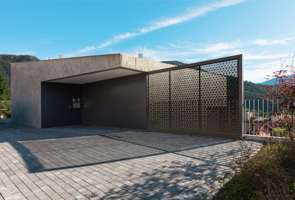 Metal Privacy Screens used as entrance screen and fence screen displayed with modern architectural house and landscape