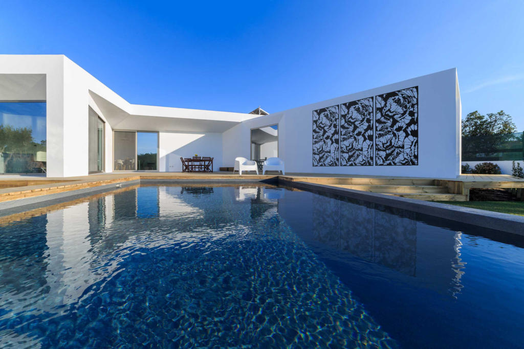 Black Decorative Screen displayed as art work in a modern pool landscape