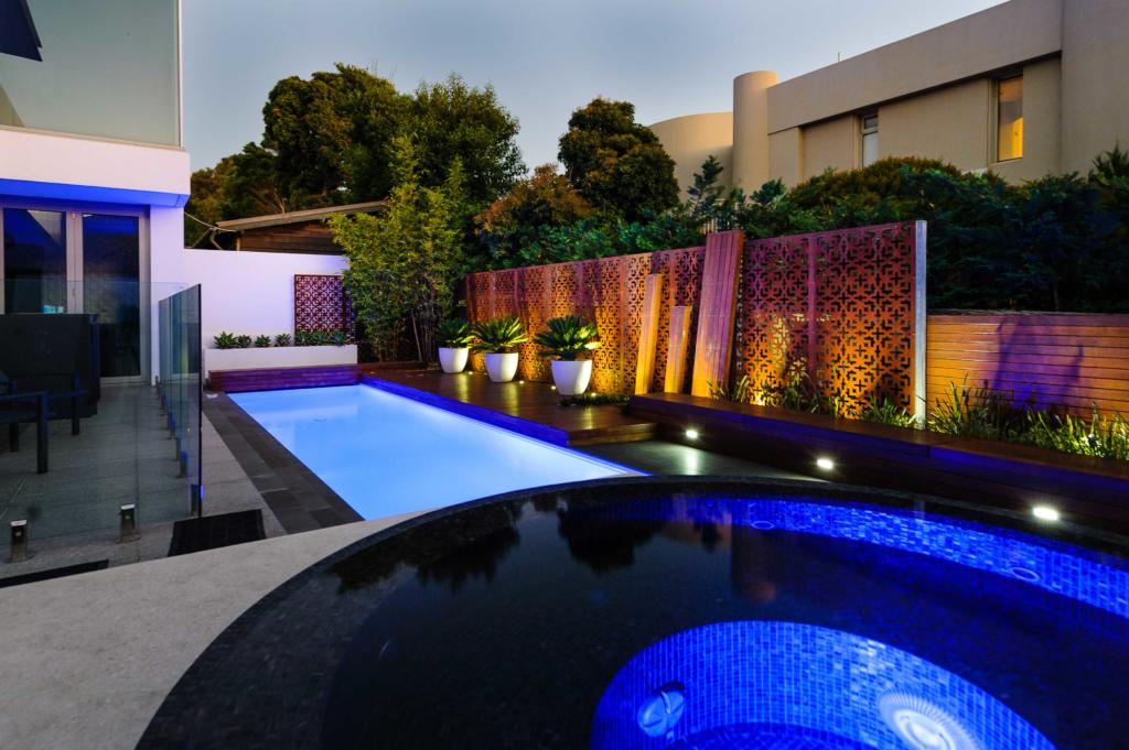 Laser cut Decorative screens by Lump Studio used as pool fence