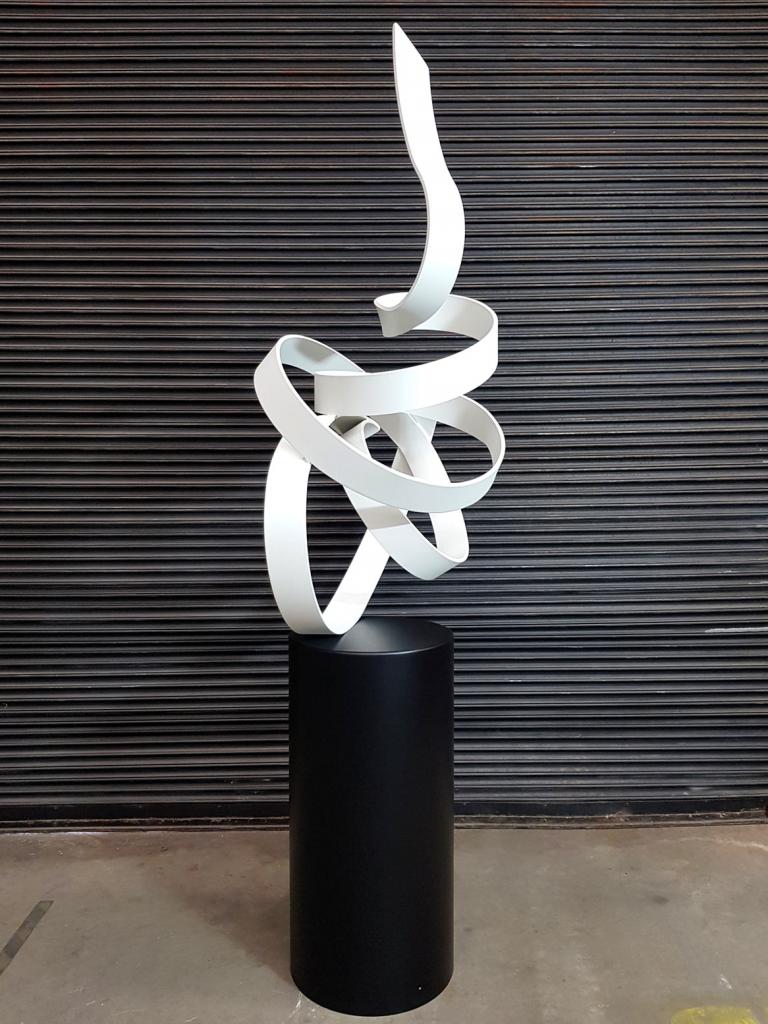 Signature Series Sculptures by Lump Sculpture Studio; White sculpture by Lump Studio