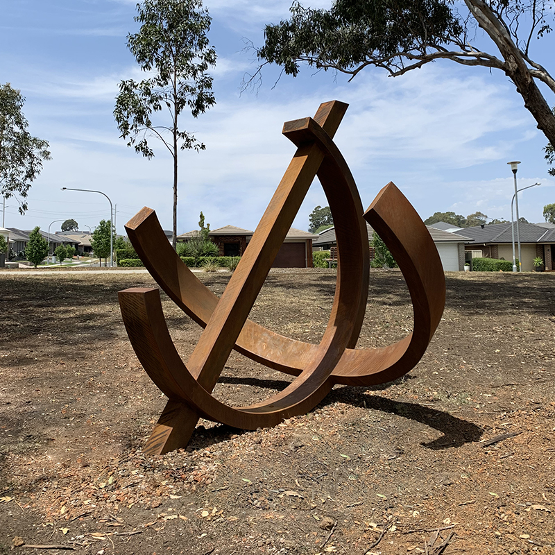 Public artwork Apple and The Needle fabricated by Lump Sculpture Studio commissioned by Distictive.net.au for Gregory Hills Dart West Development