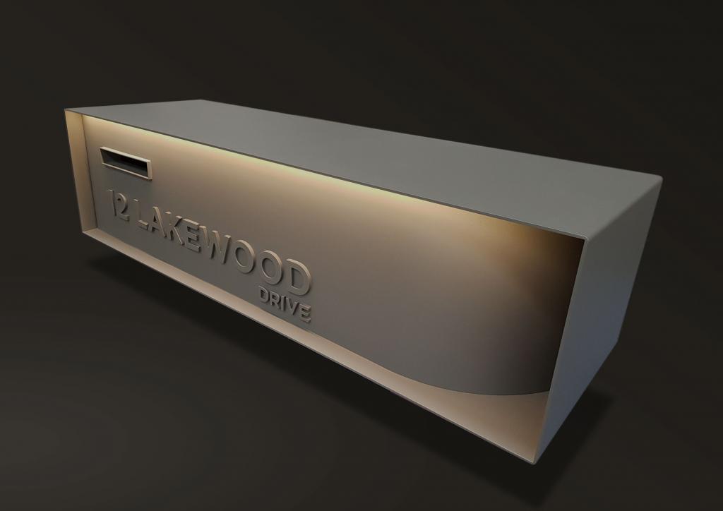Custom made letterbox with lighting made from Corten steel with laser cut address and detail