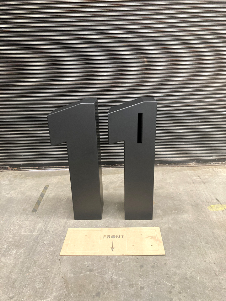 Custom Letterbox Design including giant sculptural number with mail slot parcel tray and access panel by Lump Studio