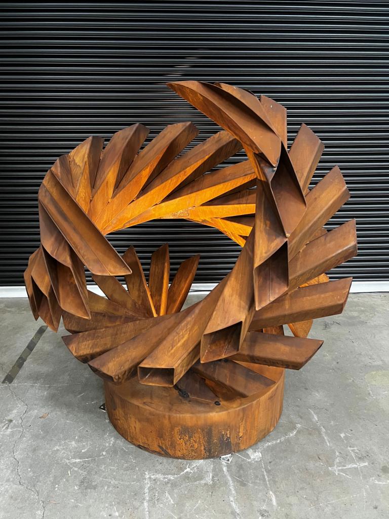 Sculpture depicting a Nest shape made from Rusted Steel by Lump Studio