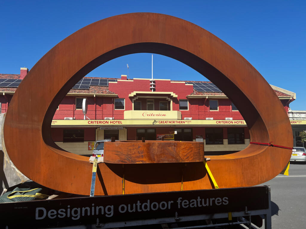 Large public sculpture made from corten steel with a natural rusted finish at the Radcliffe Estate in Wyee