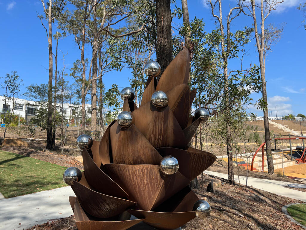 Sculpture representing an endangered Australian native flower on public display at Springfield Rise Mountain Park QLD.