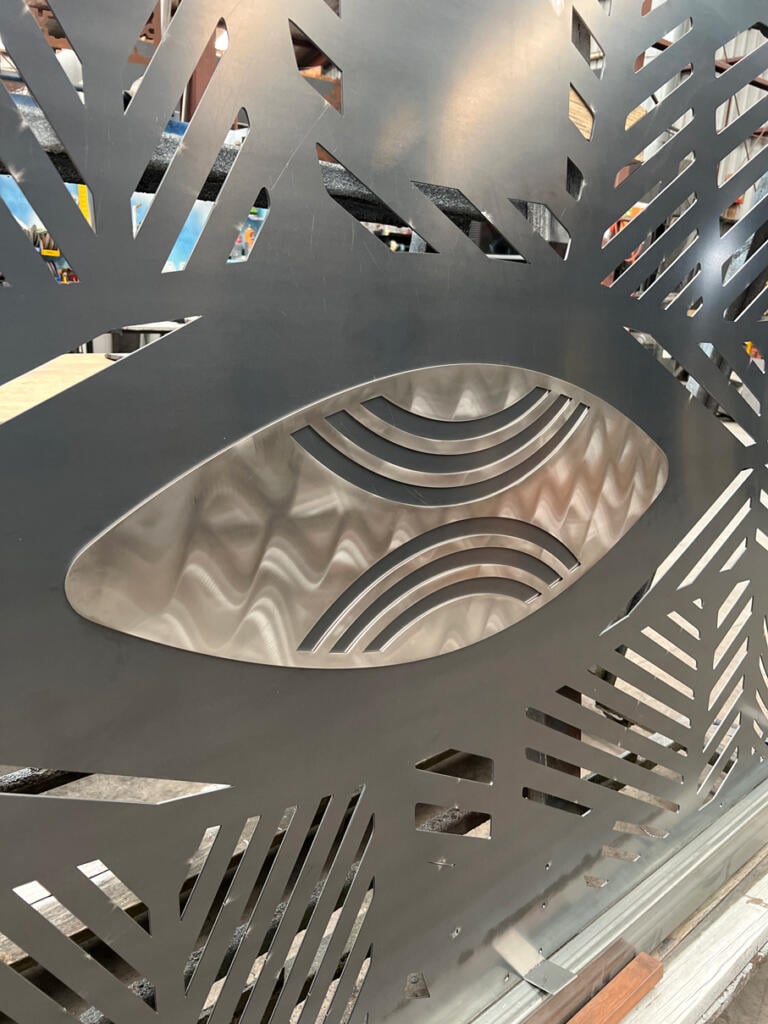 Public mural made from Corten Steel and Stainless Steel designed by Dixon Patten a Yorta Yorta, Gunnai, Gunditjmara, Wemba Wemba, Djab Wurrung man, the lead artist and designer of Bayila Creative. Fabricated and installed at Parkdale Pree School by Lump Sculpture Studio