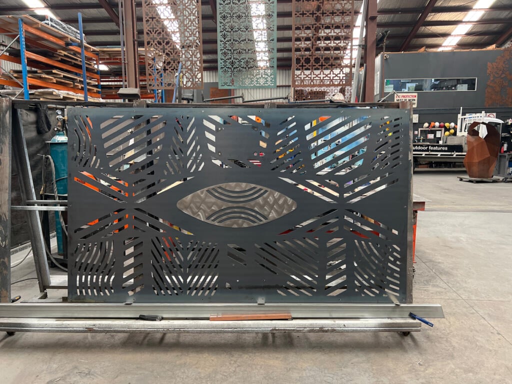 Public mural made from Corten Steel and Stainless Steel designed by Dixon Patten a Yorta Yorta, Gunnai, Gunditjmara, Wemba Wemba, Djab Wurrung man, the lead artist and designer of Bayila Creative. Fabricated and installed at Parkdale Pree School by Lump Sculpture Studio