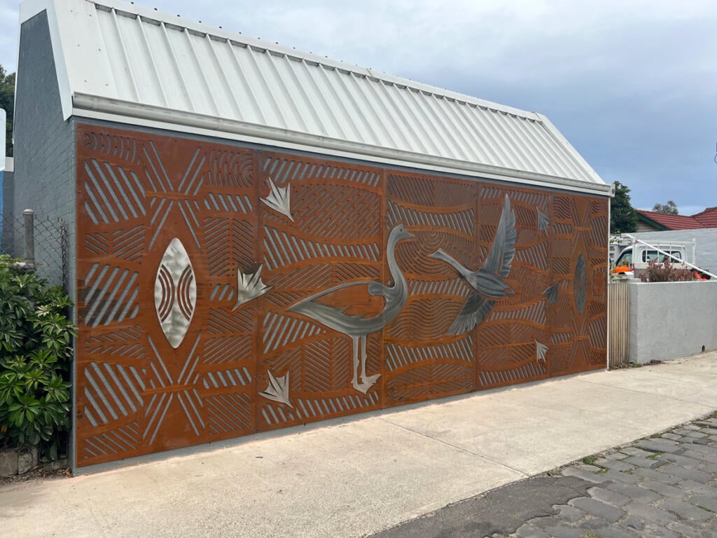 Public mural made from Corten Steel and Stainless Steel designed by Dixon Patten a Yorta Yorta, Gunnai, Gunditjmara, Wemba Wemba, Djab Wurrung man, the lead artist and designer of Bayila Creative. Fabricated and installed at Parkdale Pree School by Lump Sculpture Studio